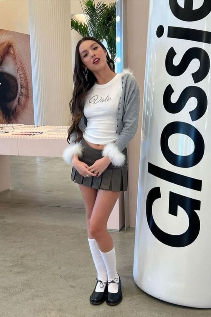 Olivia Rodrigo's Feet In High School Style Sock and Black Shoes